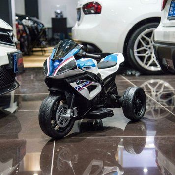 Дитячий акумуляторний мотоцикл BMW HP4 синього кольору 5008 фото